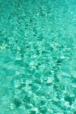 Soyut su doku kadar kapatın. Turkuaz Yüzme Havuzu su arka plan. Kopya alanı, üstten görünüm.