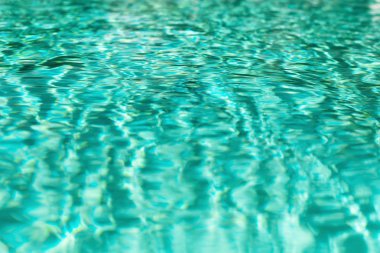Soyut su doku kadar kapatın. Turkuaz Yüzme Havuzu su arka plan. Kopya alanı, üstten görünüm.