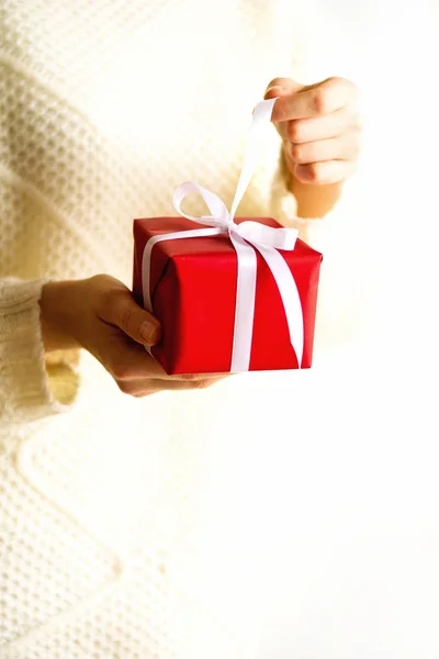 Female hands opening red gift box, copy space. Christmas, new year, birthday party, valentines day, mothers and woman day concept. Present with love. Banner Royalty Free Stock Photos