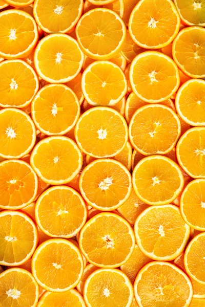 Fresh sliced orange fruit texture. Macro, top view, copy space, banner. Food frame. Juicy oranges background