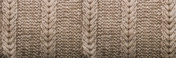 Gebreide patroon. Patroon stof gemaakt van wol. Achtergrond, kopie ruimte. Banner — Stockfoto