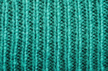 Örme doku. Yünden kumaş. Turkuaz arka plan, kopya alanı