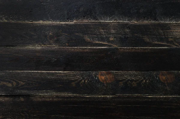 Black painted wood texture background, copy space, top view — Stock Photo, Image
