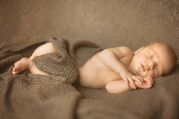 Little sleeping newborn baby in wrap creamy blanket. 13 days old. Copy space for your text. Maternity, family, birth concept. — Stock Photo, Image