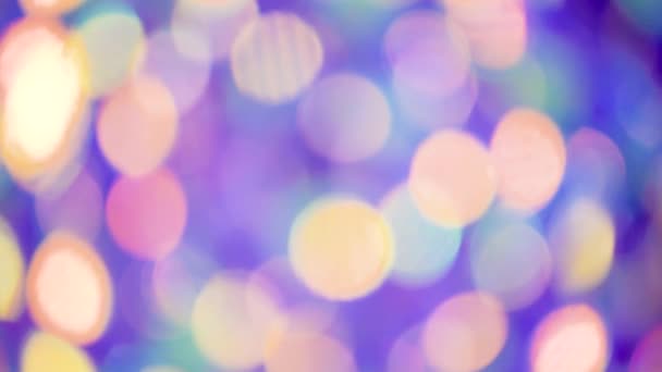 Moving violet bokeh lights. Festive defocused lights. Christmas and New year background — 비디오