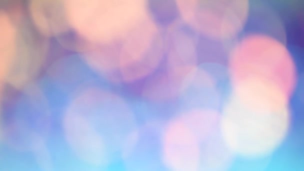 Bougeons de lumière violette. Festive lumières déconcentrées. Noël et Nouvel An fond 