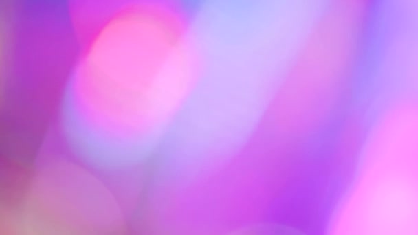 Multicolored motion gradient background. Blurred bokeh background of holiday lights. Festive greeting card. Colorful pattern wallpaper. Festive texture. — 비디오