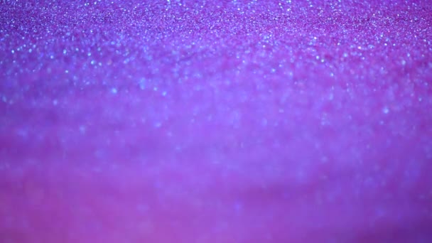 Violett och lila abstrakt bokeh ljus. Glänsande glitter bakgrund. Nytt år och julkoncept. Rosa glittrande gratulationskort — Stockvideo