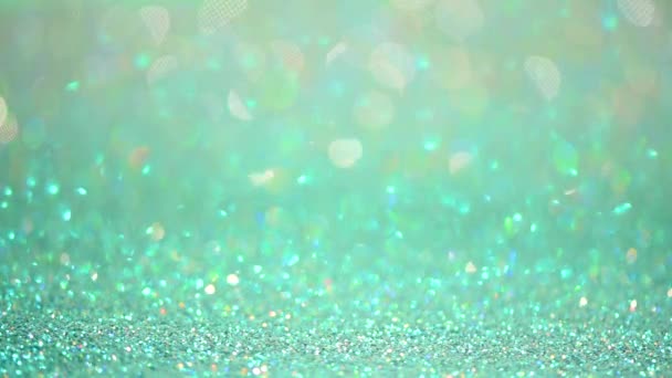 Green abstract bokeh lights. Shiny glitter background. New year and Christmas concept. Sparkling greeting card — 비디오