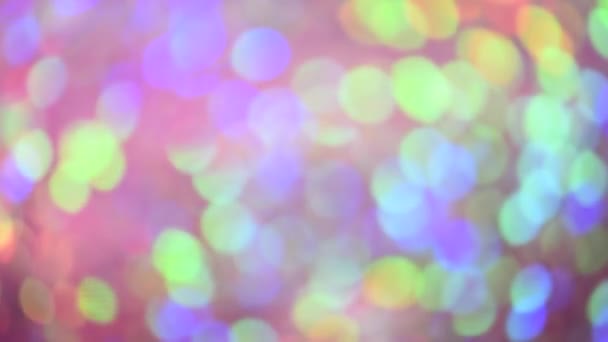 Déplacement de lumières bokeh multicolores. Festive lumières déconcentrées. Noël et Nouvel An fond 