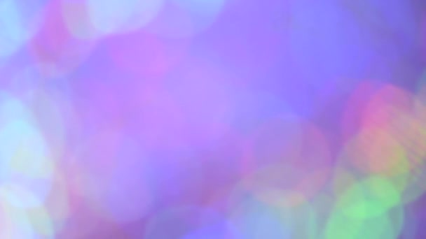 Feestelijke textuur. Veelkleurige beweging gradiënt achtergrond. Kleurrijk patroon behang. Wazig bokeh achtergrond van vakantie verlichting. Feestelijke wenskaart. — Stockvideo