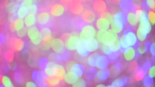 Déplacement de lumières bokeh multicolores. Festive lumières déconcentrées. Noël et Nouvel An fond — Video