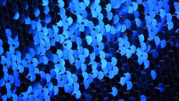 Em movimento lantejoulas fundo. Férias e textura festiva. Lantejoulas azuis e fundo brilhante . — Vídeo de Stock