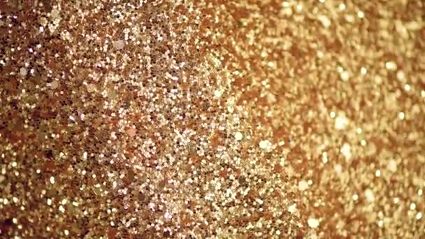 Sparkle glittrande bakgrund. Semesterabstrakt textur. Julkort med guld bokeh, defocused lampor. — Stockvideo