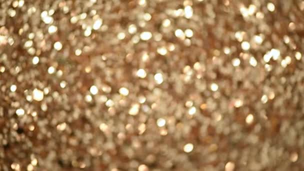 Glitter fondo abstracto desenfocado con luces borrosas, estrellas. Textura navideña festiva. Fiesta de año nuevo — Vídeos de Stock
