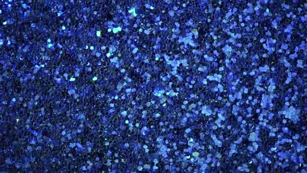 Blauwe en zilveren abstracte bokeh lichten. Glanzende glitter achtergrond. Nieuwjaar en kerstconcept. Sprankelende wenskaart — Stockvideo