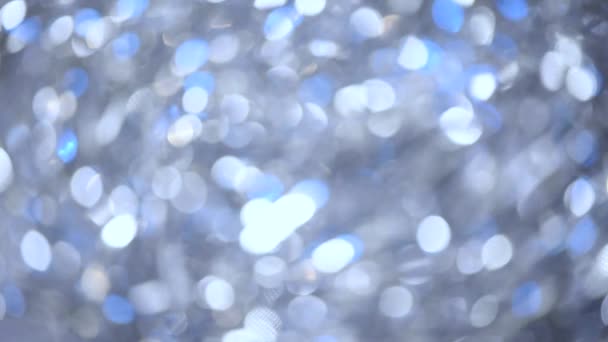 Luci astratte bokeh blu e argento. Brillante sfondo glitter. Anno nuovo e concetto di Natale. Biglietto di auguri frizzante — Video Stock