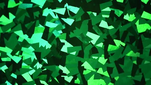 Abstract crystal background. Shimmer of green glitter texture. Shiny backdrop rotation — Stock Video