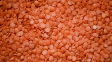 Kırmızı organik mercimek doku değişimi. Yemek malzemesi geçmişi. Üst görünüm