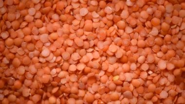 Kırmızı organik mercimek doku değişimi. Yemek malzemesi geçmişi. Üst görünüm