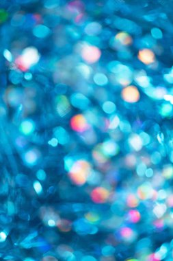 Mavi ve gümüş soyut bokeh ışıkları. Odaklanmamış arka plan. Uzayı kopyala Şenlik dokusu