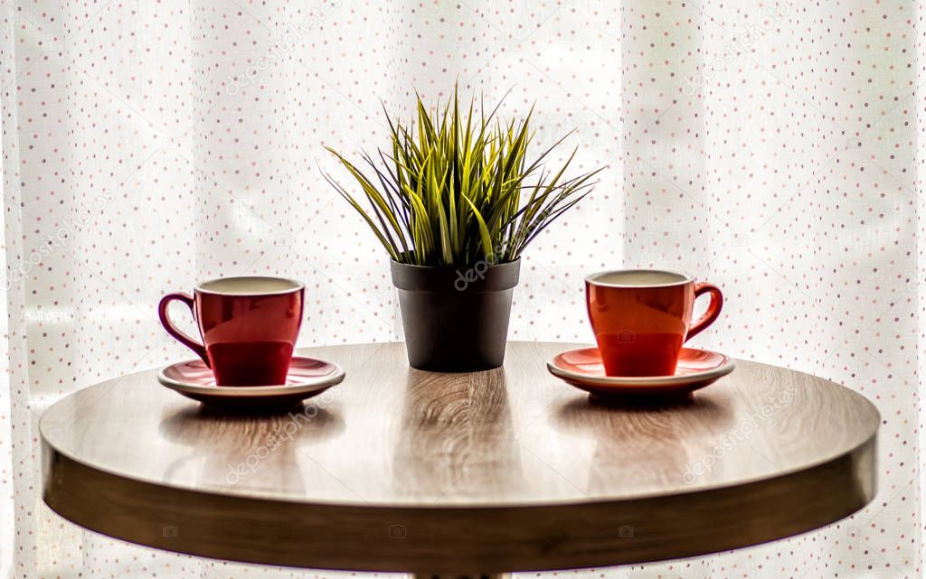 still life colorful tea cups on the wooden table