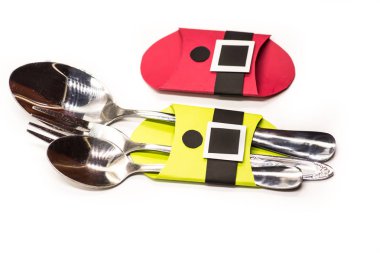 Noel çatal bıçak takımı sahipleri. beyaz izole kağıt el sanatları