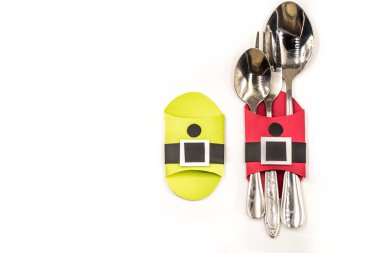 Noel çatal tutucu. beyaz izole kağıt el sanatları