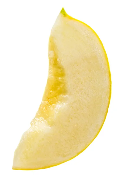 Fetta di melone giallo isolato su bianco — Foto Stock
