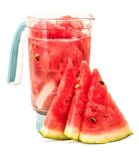 Watermelon and mineral water in a blender. making a smoothie in a blender. blender with watermelon and watermelon slices isolated on white background — Stock Photo, Image