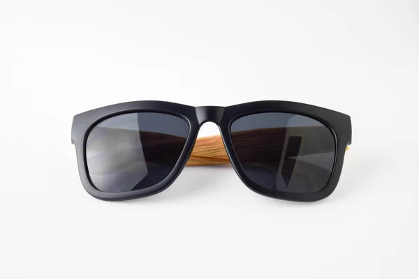 Svarta solen glassess träben på vit bakgrund — Stockfoto
