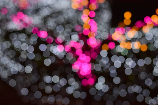 Bokeh de luz roja y blanca con fondo oscuro —  Fotos de Stock