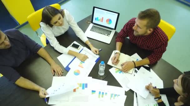 Creative work. Top view of business people working together while sitting at the table — Stock Video