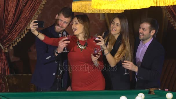 Two couples at the party take a selfie with glasses — Stock Video