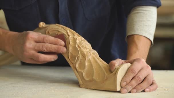 Hardworking carpenter polishing wood using abrasive paper — Stock Footage Hardworking carpenter polishing wood using abrasive paper Video Clip
