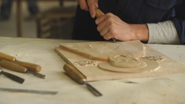 Gouge wood chisel carpenter tool working wooden background, wood handcraft — Stock Video