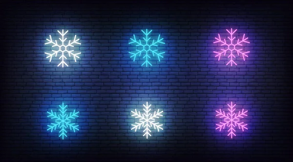 Snow icons neon. Vector glowing neon colorful snowflake icons — Stock Vector