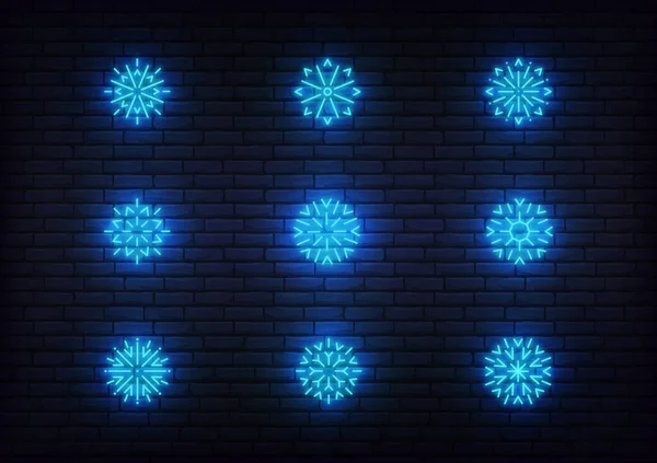 Iconos de nieve neón. Vector brillante neón azul copo de nieve iconos — Vector de stock