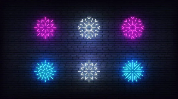 Schnee-Ikonen neon. Vektor leuchtenden neonfarbenen Schneeflocken Symbole — Stockvektor