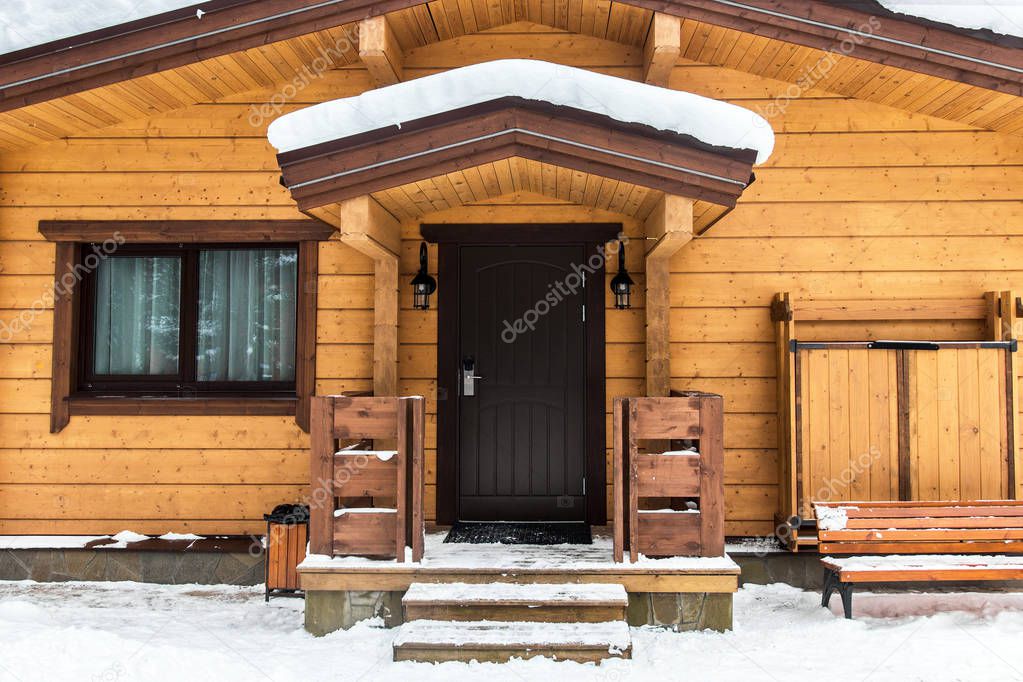 Modern wooden house in winter