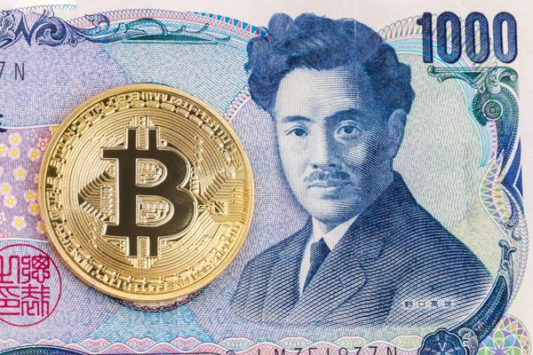 1000 で黄金 Bitcoin のクローズ アップ円紙幣の背景 — ストック写真