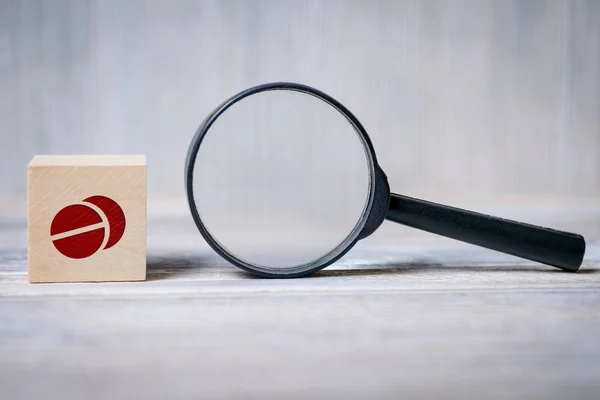 Cube with pills icon and magnifier. Concept of search medical information, health. — Stock Photo, Image