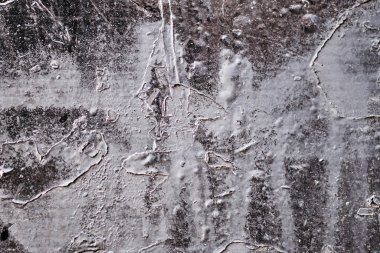 Boyadan beyaz çizgiler olan siyah alçı. Doku.