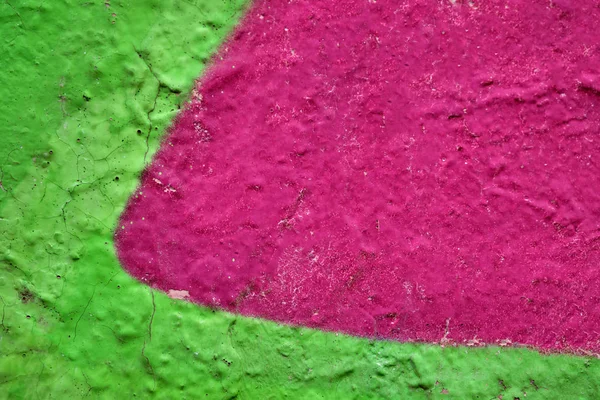 Az absztrakt minta a falon lédús rózsaszínre és zöldre van festve.. — Stock Fotó
