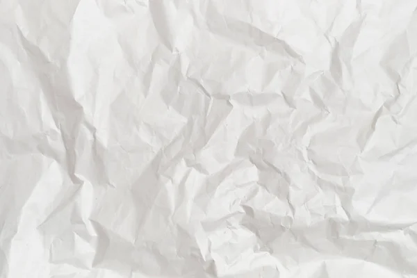 Bakgrund och textur av vitt skrynkligt papper. — Stockfoto