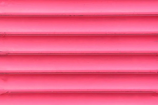 Фон и текстура металлических ворот розового цвета — стоковое фото