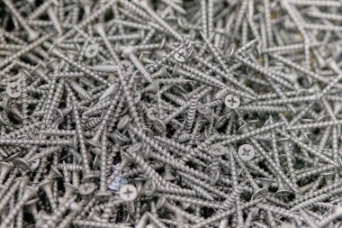 Siyah vidalar, arka plan, mağazadaki doku. Kapat..