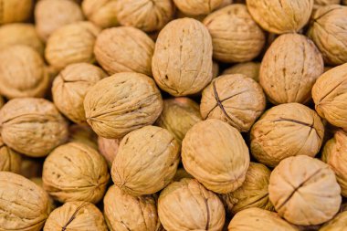 Soyulmamış ceviz özgeçmişi ve dokusu. Kapat..