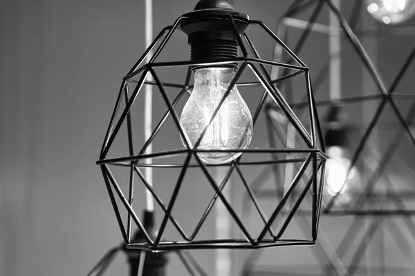 Modern decorative lamps made of steel bars. Close up. black and white