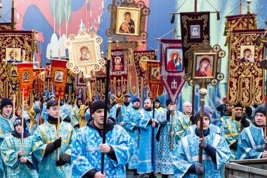 RUSSIA, ST.PETERSBURG - February 16, 2020: Orthodox priests with icons are religious procession. Close up.